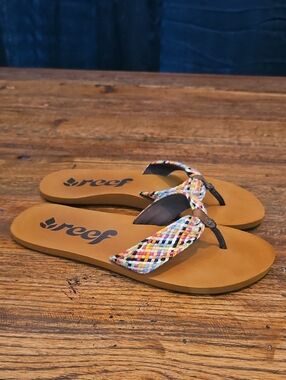 Reef Women’s Tan Footbed Flip Flops with Multicolor Braided Straps